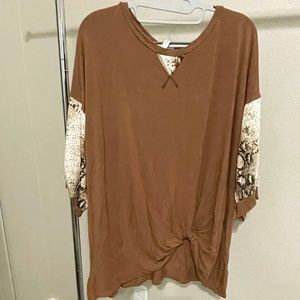 Dressy t-shirt. Brown with snakeskin print sleeves. Elbow length.